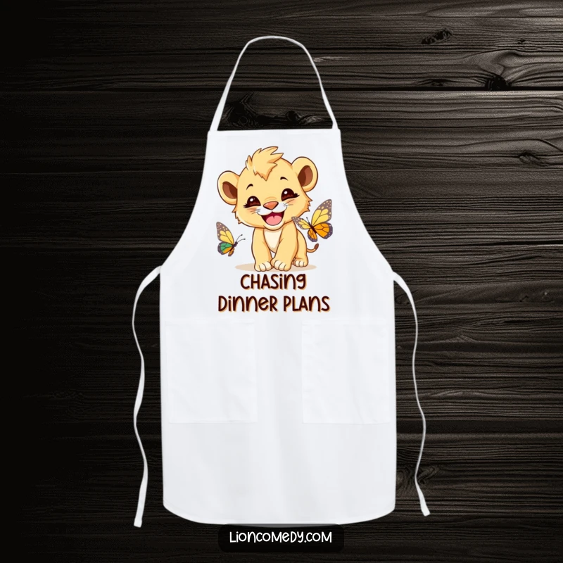 Funny Lion Cub Butterfly Apron, a cute lion cub with a wide grin, chasing a butterfly, perfect for kitchen use.