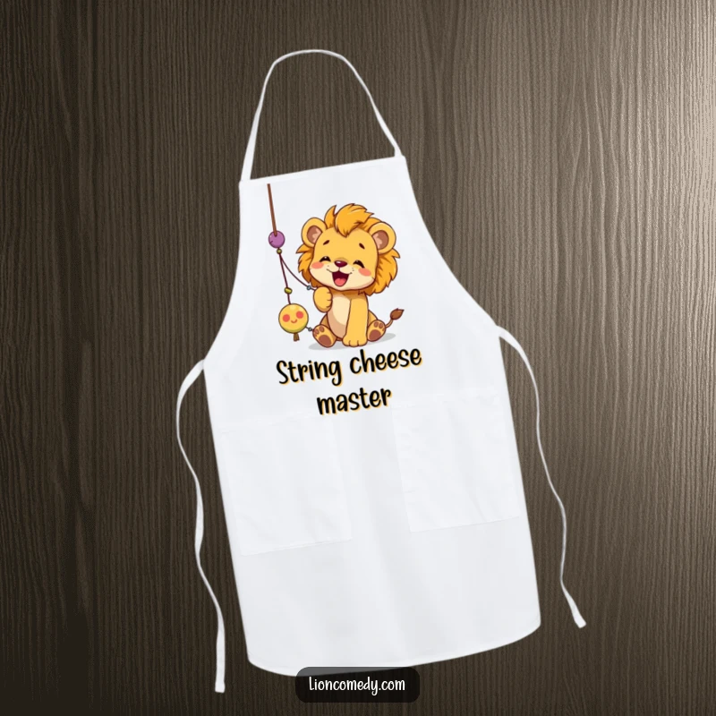 Funny lion cub apron depicting a cub joyfully batting at a dangling string toy with its paws, full of playful energy.