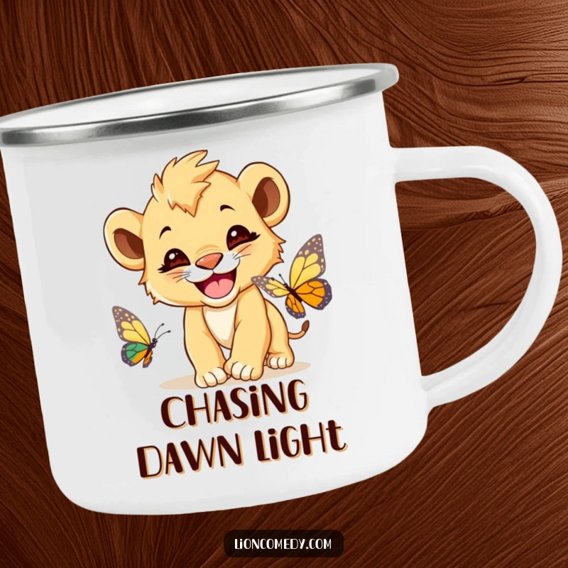 Funny Lion Cub Butterfly Camping Mug, a cute lion cub with a wide grin, chasing a butterfly, ready for outdoors.