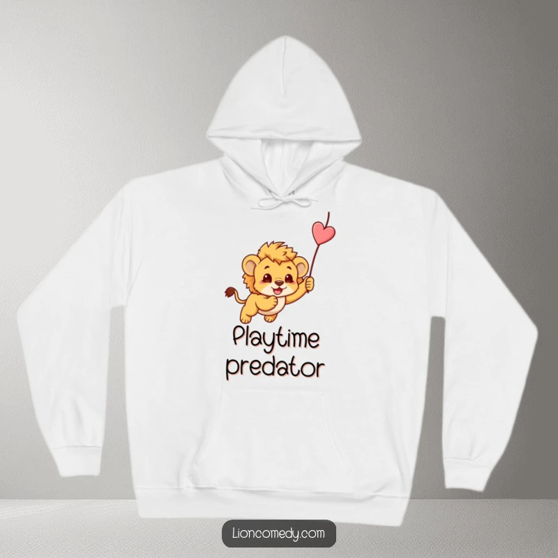 Funny cozy hoodie with a kawaii lion cub in a playful pouncing pose on a dangling string, perfect for gifting.