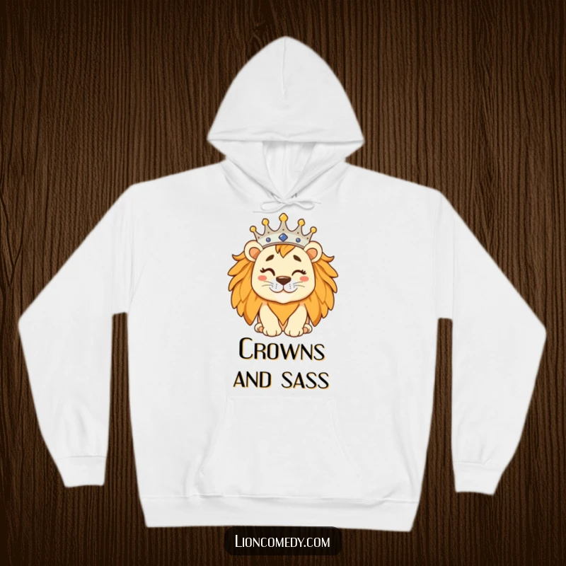A cozy hoodie featuring a silly lion with a tilted crown, winking knowingly, exuding playful regal charm.