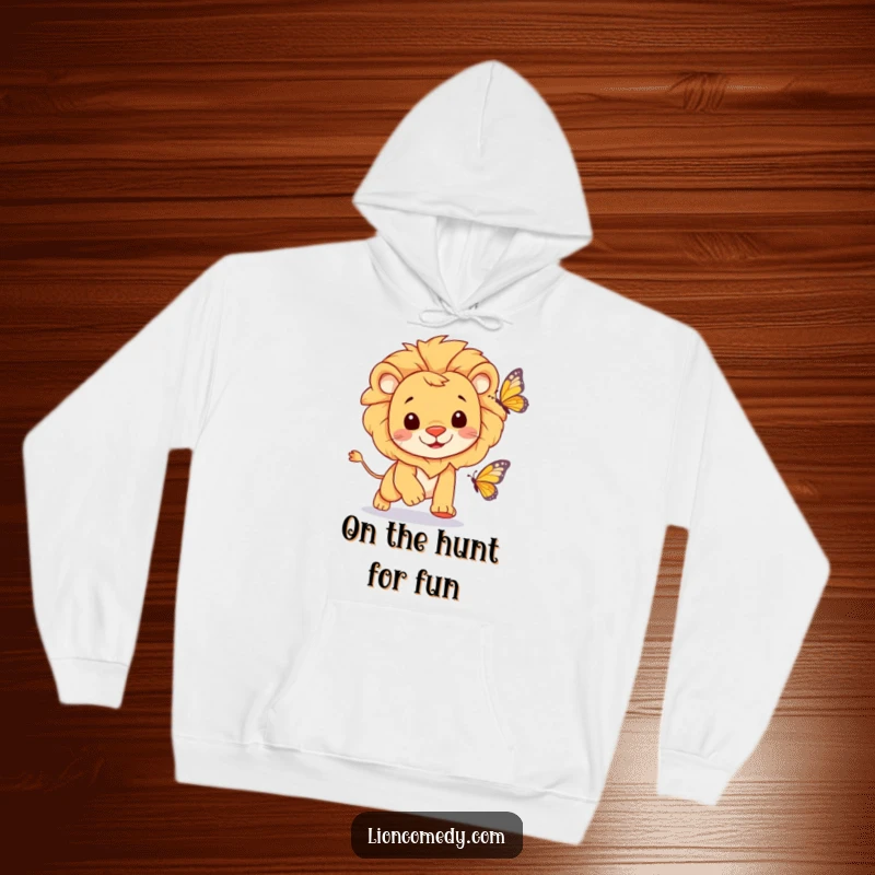 A cozy hoodie featuring a cheerful lion with a happy expression playfully chasing a butterfly.