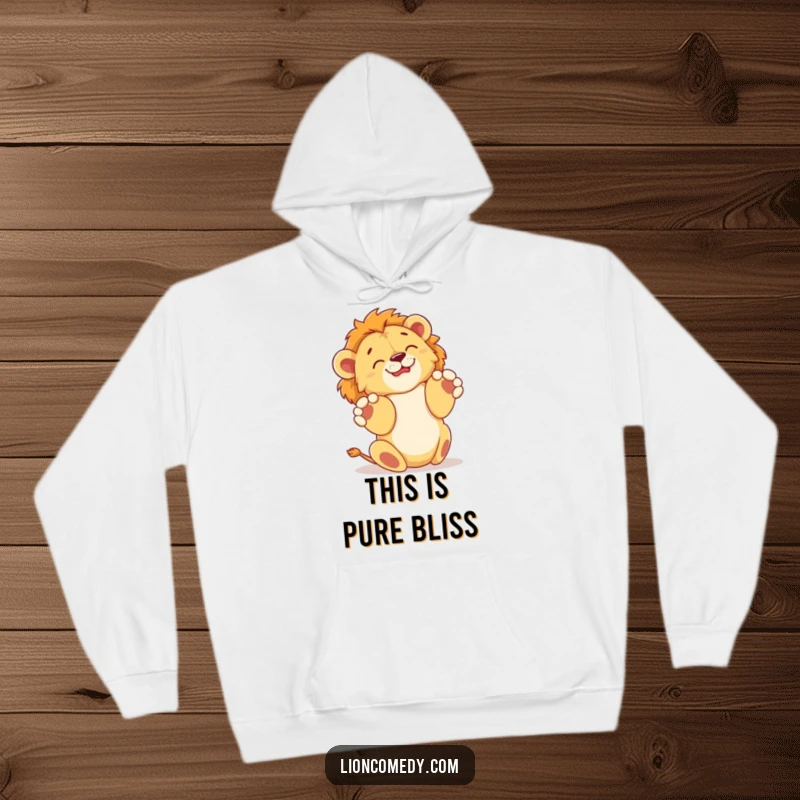 Funny hoodie showing a lion cub happily rolling on its back with paws up, offering warmth and a comical depiction of pure joy.