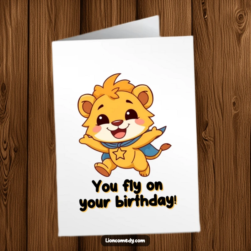 Funny Free Printable Birthday Card: Smiling lion cub in a superhero cape flies joyfully, celebrating a super birthday.