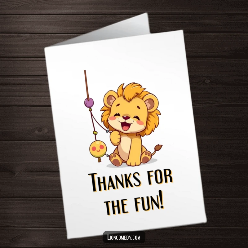 Funny Free Printable Thank You Card depicting a cute lion cub playfully swatting at a dangling string toy.