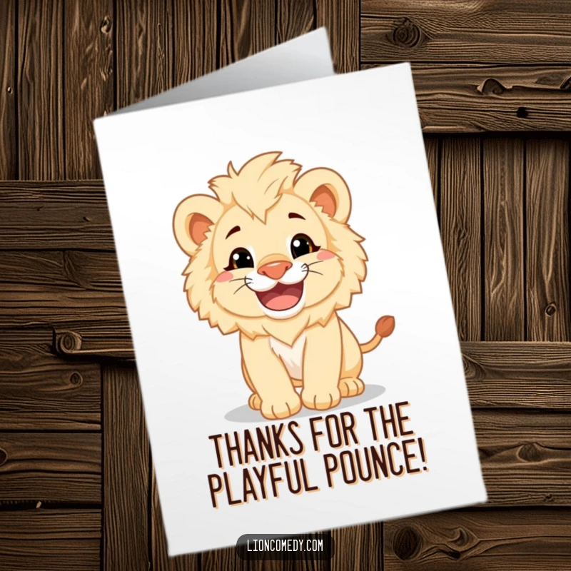 Funny Free Printable Thank You Card: A fluffy lion cub with a huge grin playfully pounces, delivering a humorous and adorable thank you.