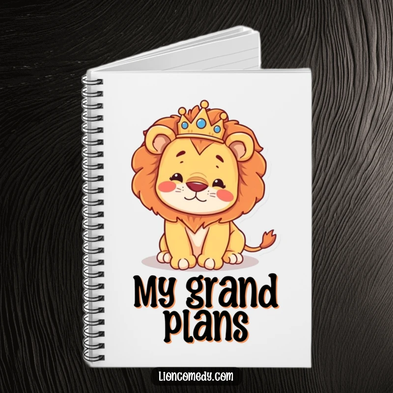 Funny notebook with a regal kawaii lion wearing a crown, hilariously stumbling, perfect for jotting notes.