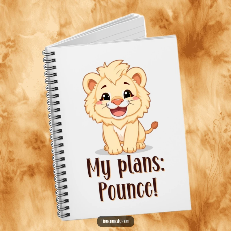 A notebook featuring a fluffy lion cub with a big grin, pouncing playfully, perfect for jotting down creative ideas.