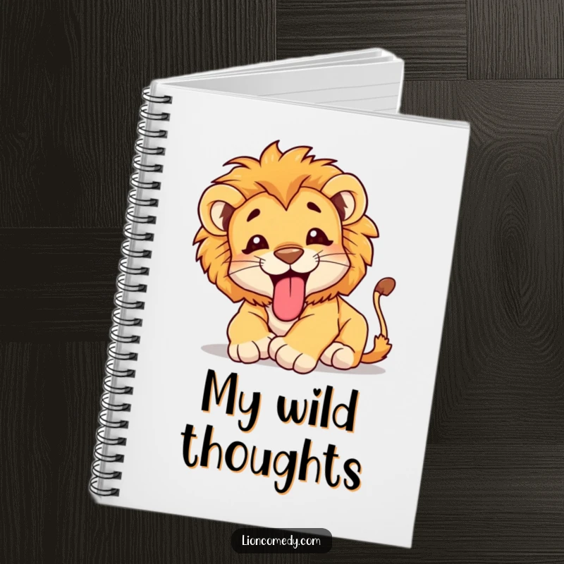 Funny Notebook showcasing a happy lion cub tumbling with its tongue out, providing a cute and humorous cover for notes.