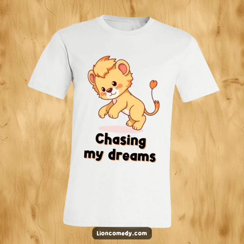 Funny Lion Cub T-Shirt: A humorous lion cub energetically chases its own tail in a dizzy circle.