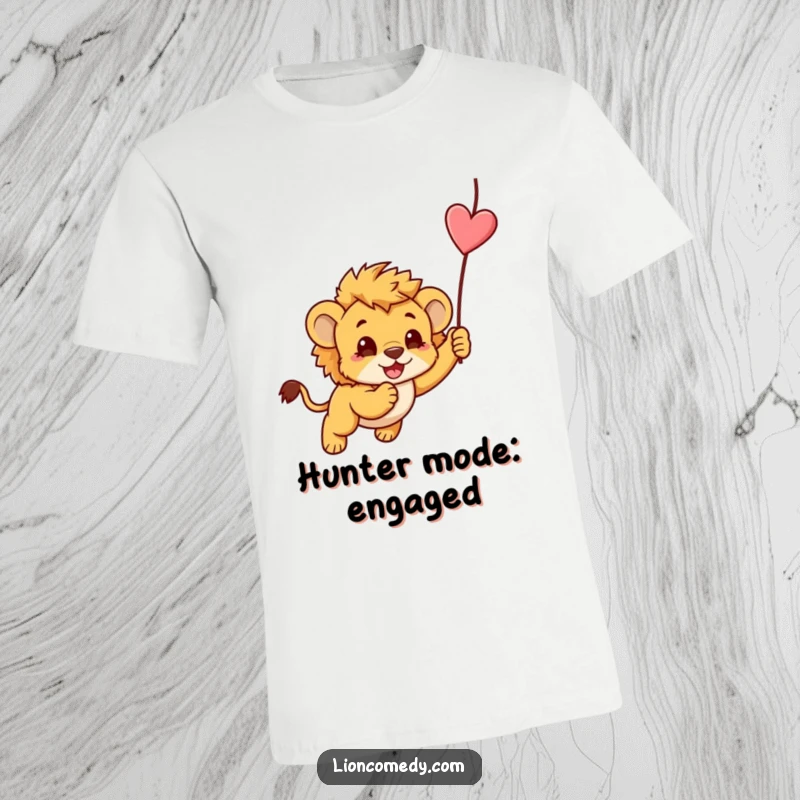 Funny kawaii lion cub, playfully pouncing on a dangling string, captured on a soft and comfortable t-shirt.