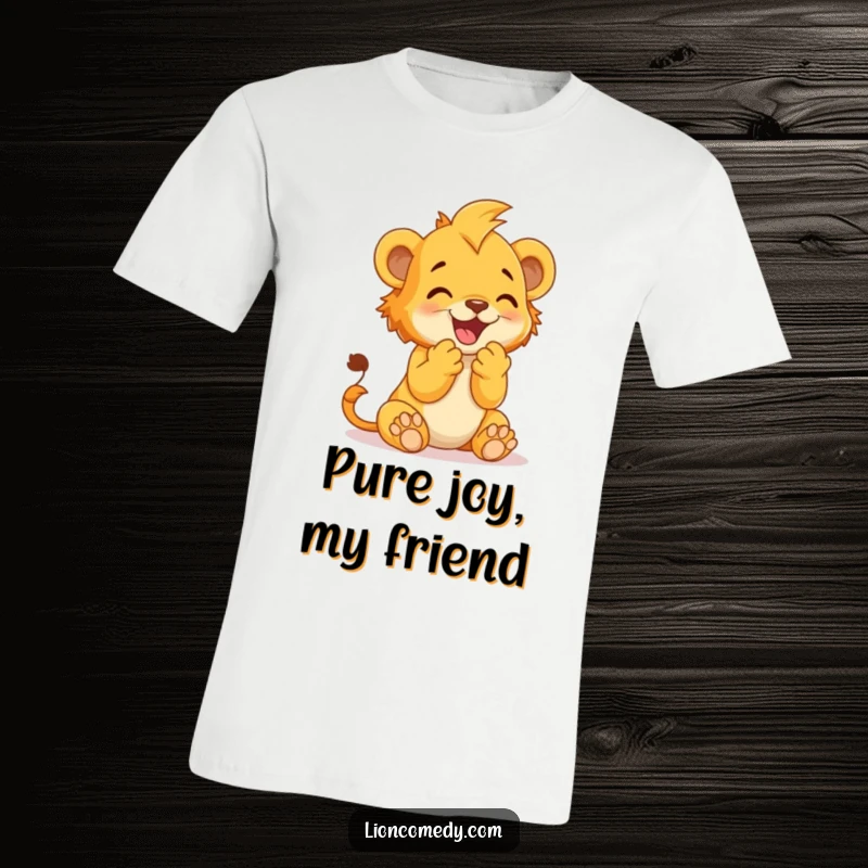 Funny T-Shirt depicting a lion cub clapping its paws together with pure delight, radiating happiness.