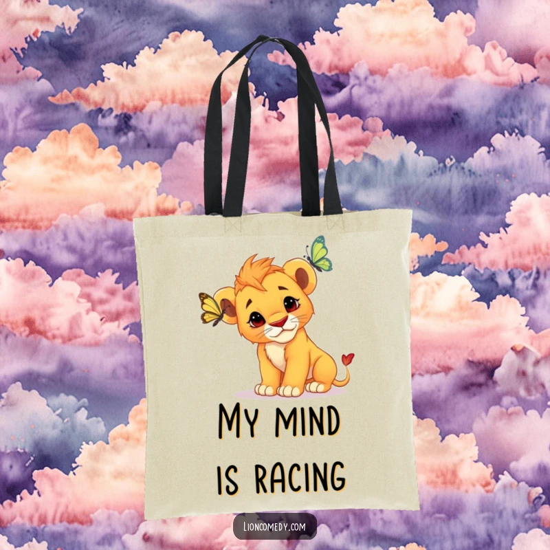 Funny Lion Cub Tote Bag: A curious cub tilts its head, intently watching a butterfly flutter by, perfect for everyday use.