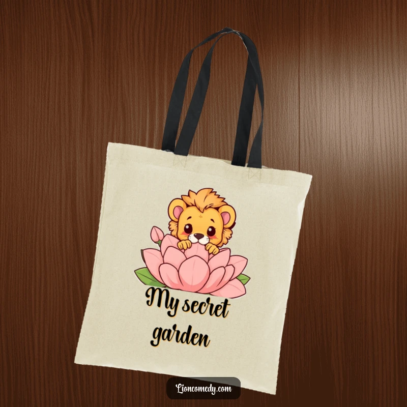 Funny tote bag featuring a lion cub playfully peeking over a large, stylized flower, a humorous and practical accessory.